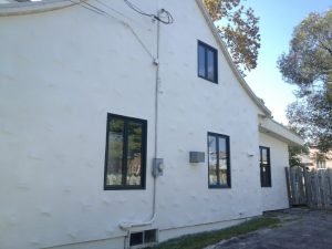 Réparation de fissures et peinture de stucco