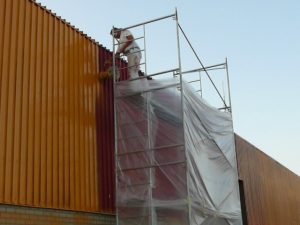 Application de peinture au fusil sur tôle galvanisée