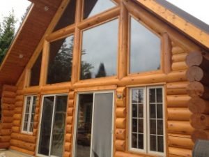 Décapage et Teinture de maison en bois rond